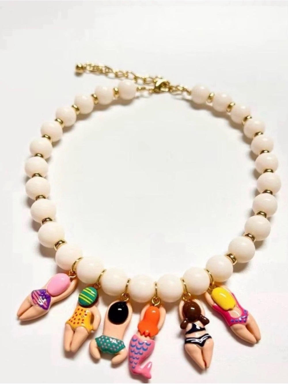 Anthropologie White Beaded Necklace with Colorful Swimmer & Mermaid Charms - Picture 3 of 3